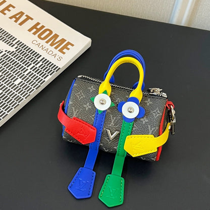 Key holder and ornament for decorating the Mister Keepall bag