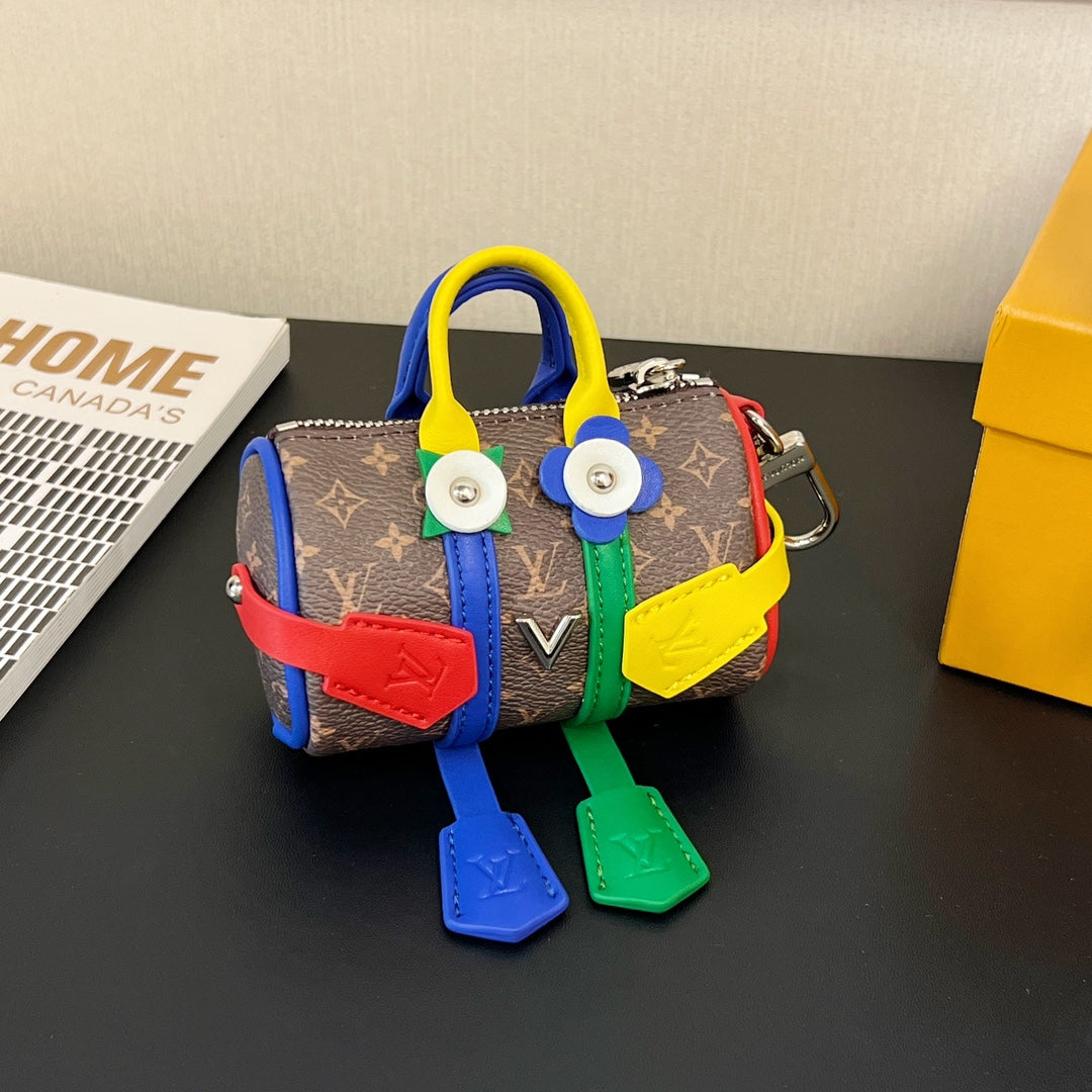 Key holder and ornament for decorating the Mister Keepall bag