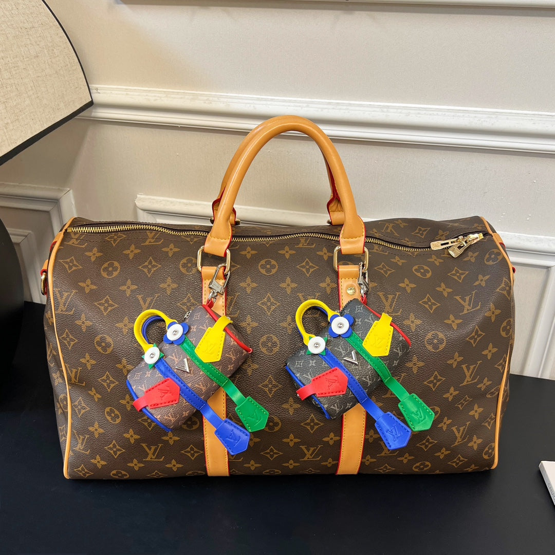 Key holder and ornament for decorating the Mister Keepall bag